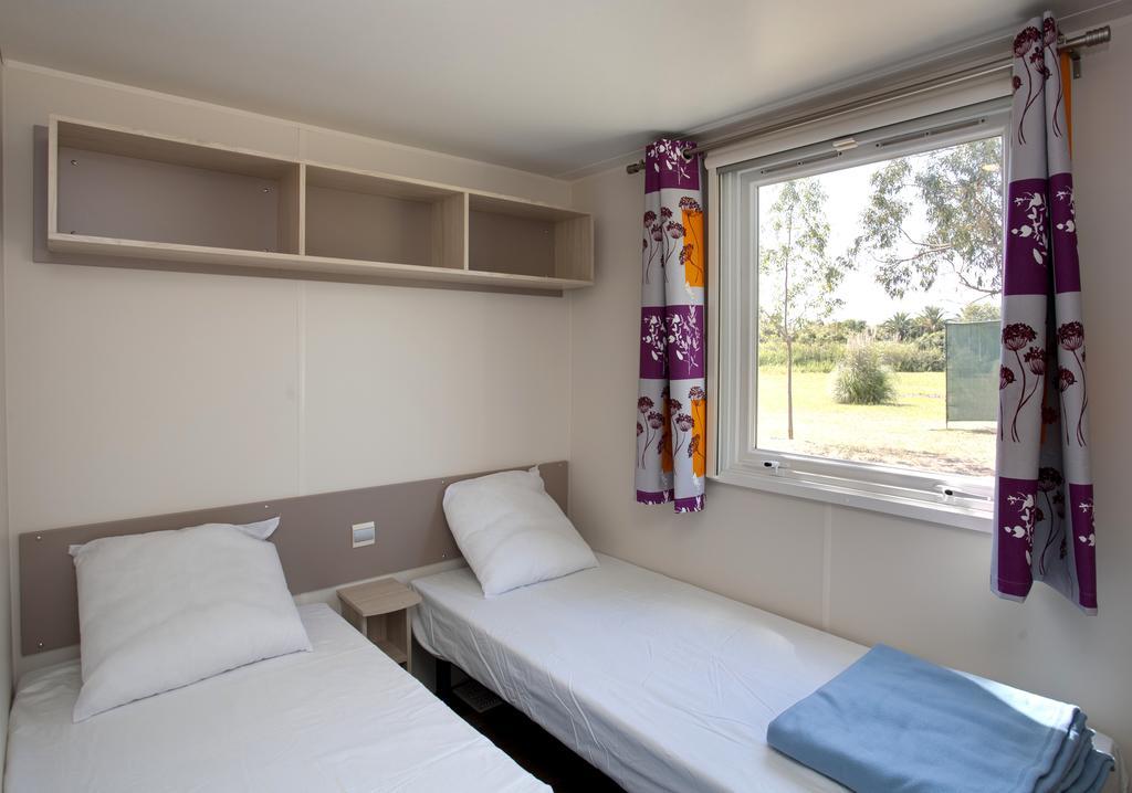 Camping Miami Plage Hotel Poggio Mezzana Bilik gambar